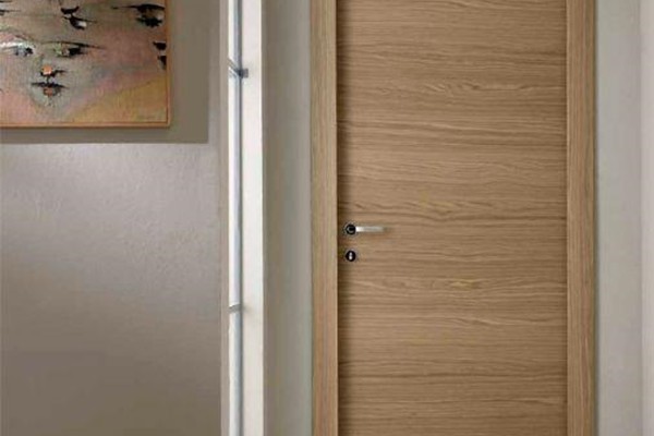 vendita porte portoni portelli scurini in legno massello